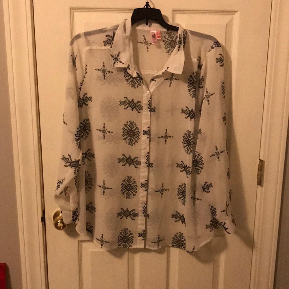 A sheer long sleeve collared shirt